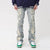 A person is styled in a navy jacket and the Ropa Grunge Y2K Hole Ripped Baggy jeans in washed blue from Kanye Streetwear Store, matched with white and green sneakers. The photo is cropped just above the shoulders, highlighting the edgy outfit.