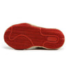 The image shows the bottom of a Chunky Pokerdot Brim Sole Sneaker in Red by Vexlly, featuring a red outsole with a herringbone traction pattern for grip. The rest of the shoe's design and colors are not visible in this view.