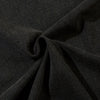 Close-up of the Vintage Black T-Shirt from Vexlly, featuring a dark gray fabric gathered at the center to create subtle folds and textures. The material appears soft and slightly heathered, suggesting a cozy feel. Observe how the color varies under different lighting conditions, highlighting its unique charm.