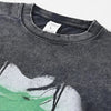 Close-up of a My Store Vintage Oversized Hip Hop T-shirt in gray featuring a bold abstract design in green and black. The collar tag indicates the size as "L," and the fabric has a textured, worn-in appearance, ideal for 2024 summer streetwear.