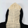 A crocheted hood from My Store showcases a black and cream color scheme with a dotted pattern and vertical stripes in the center, emphasizing the striking color contrast.