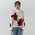 Sweatshirt mit V-Ausschnitt und Blumenmuster in Rot