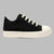 The Rugged Minimal Sleek Sneaker in Black by Off-Bound Trend Store is showcased against a gray background, featuring white laces, a white toe cap, and a white sole.